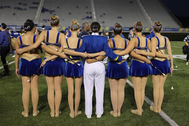 UDMB Golden Girl Twirlers and Drum Major post game 2022